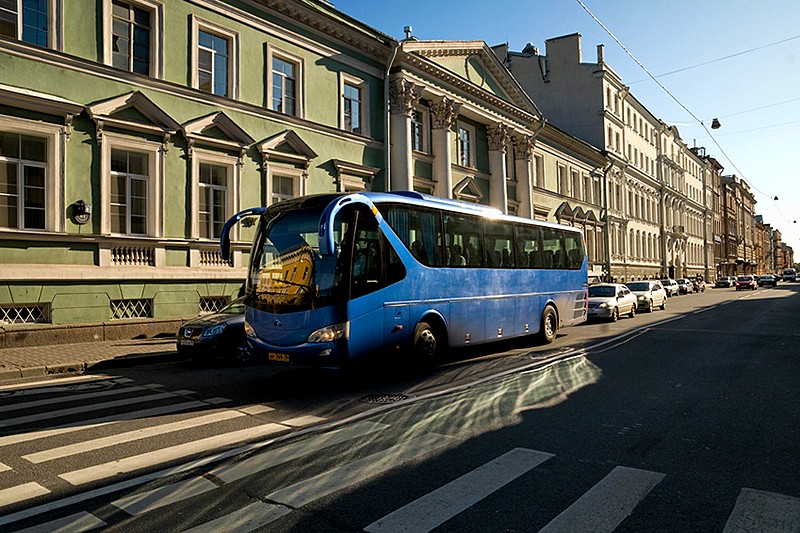 Tour bus on Millionnaya Ulitsa in St Petersburg, Russia Tour bus on Millionnaya Ulitsa in St Petersburg, Russia