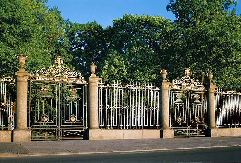 Palace Embankment and the wrought-iron fence of the Summer Garden in St Petersburg, Russia