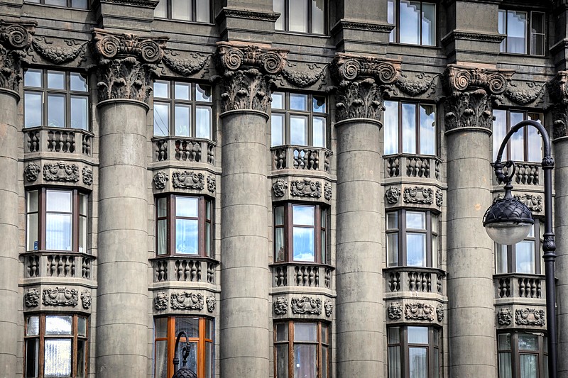 Columns spanning four floors of the Markov Apartment Buildings in Saint-Petersburg, Russia Columns spanning four floors of the Markov Apartment Buildings in Saint-Petersburg, Russia