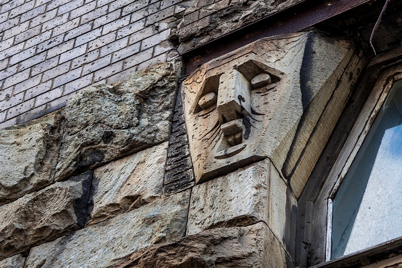 Stone faces on the Bubyr House in St Petersburg, Russia