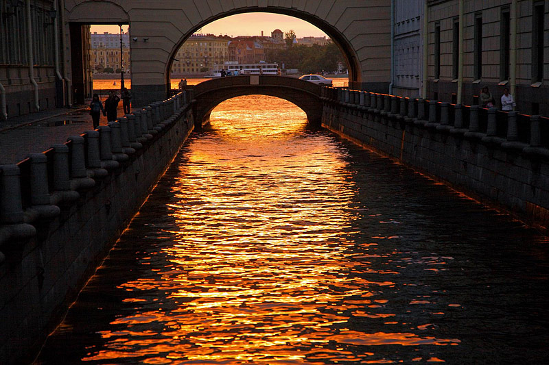 Hermitage Bridge and the Winter Channel at sunset in St Petersburg, Russia