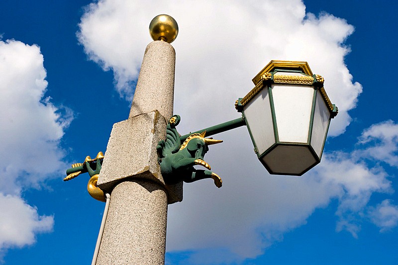 Elegant lantern on Lomonosov Bridge over the Fontanka River in St Petersburg, Russia