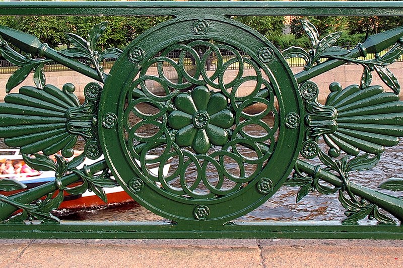 Wrought-iron railings of Lower Swan Bridge in St Petersburg, Russia