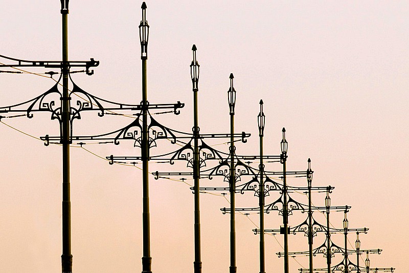 Poles for tram wires on Trinity Bridge in St Petersburg, Russia