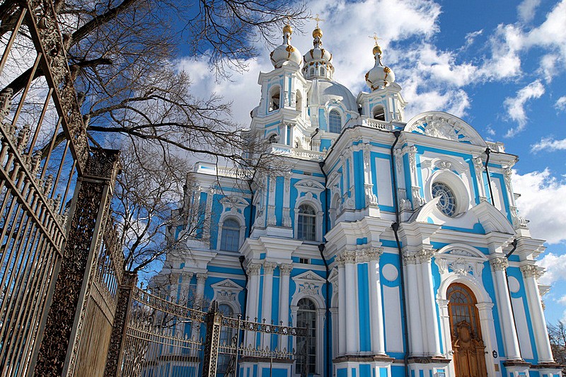 Smolny Cathedral and the wrought-iron fence of Smolny Garden in Saint-Petersburg, Russia