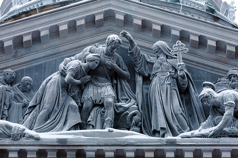 Western pediment of the cathedral with the sculptural group 'Meeting of St. Isaac of Dolmatia with Emperor Theodosius' in St Petersburg, Russia