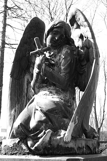 Angel on a tombstone at Novodevichye Cemetery in St Petersburg, Russia