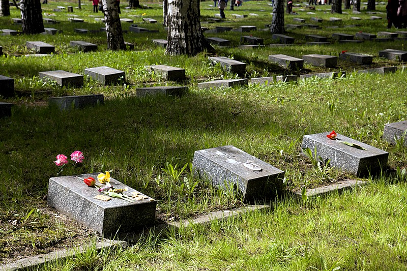 Soldiers' tombs at Piskaryovskoye Memorial Cemetery in St Petersburg, Russia