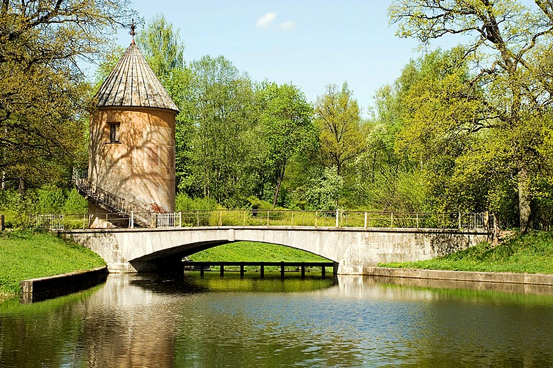 Pil Tower (Mill) and bridge over the Slavyanka River in Pavlovsk Park, southern suburbs of St Petersburg