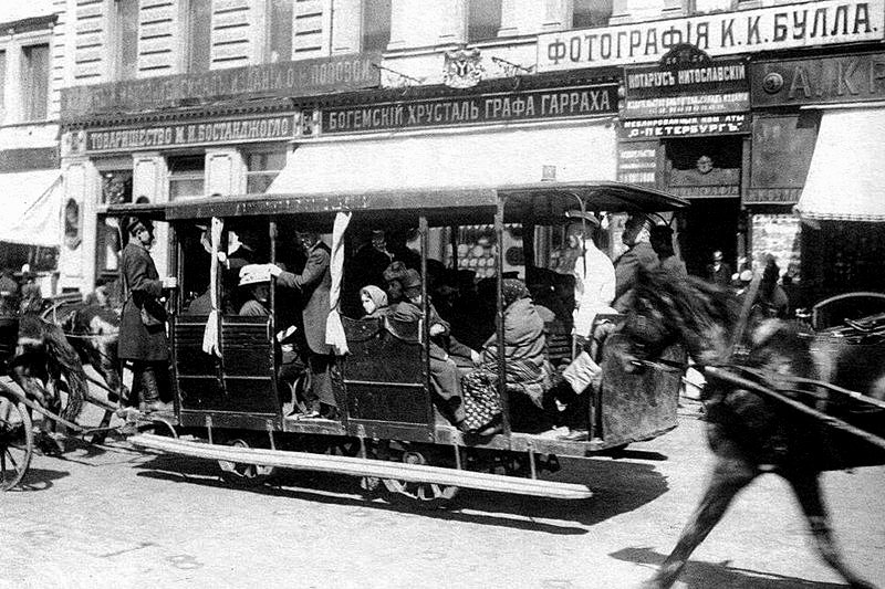 Horsetram on Nevsky Prospekt in front of house number 54 in St. Petersburg, Russia