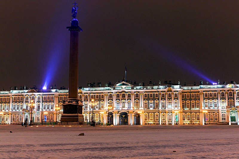 Evening view of the Alexander Column with festive lighting in St Petersburg, Russia