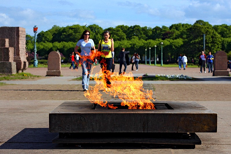 Eternal flame at the Monumnt to the Fallen Fighters of the Revolution on the Field of Mars in St Petersburg, Russia