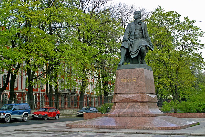 Monument to Mikhail Lomonosov (polymath) on Vasilevskiy Island next to the Twelve Colleges (St. Petersburg State University) in St Petersburg, Russia