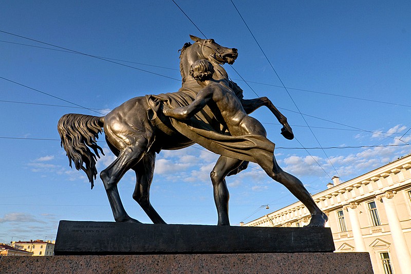 One of Horse Tamers statues on Anichkov Bridge in Saint-Petersburg, Russia