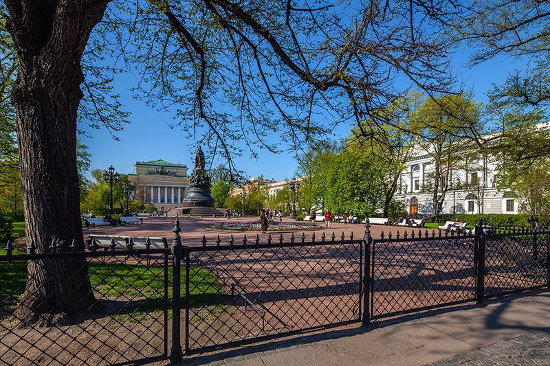 View of Catherine Garden with the statue of Catherine the Great and the Alexandrinsky Theater in Saint-Petersburg, Russia
