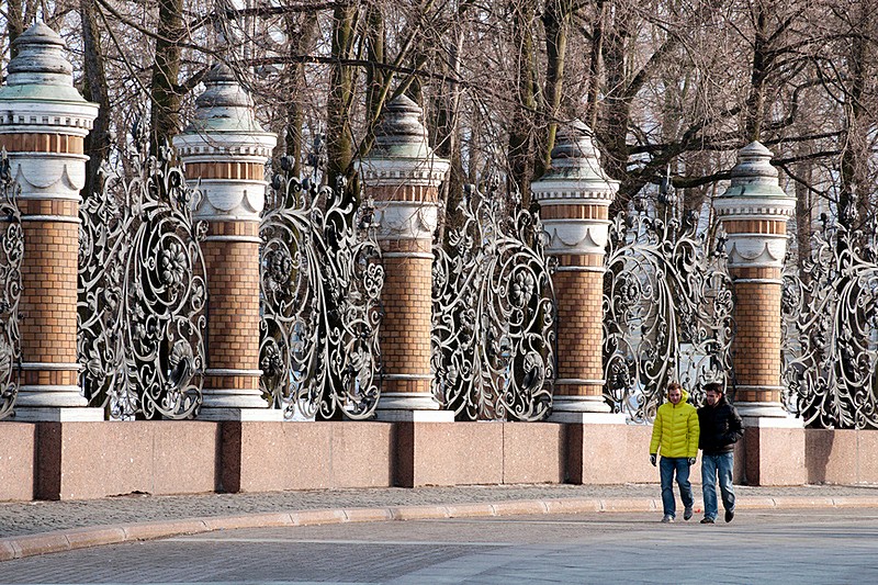 Winter view of Mikhailovsky Garden's wrought iron fence in Saint-Petersburg, Russia