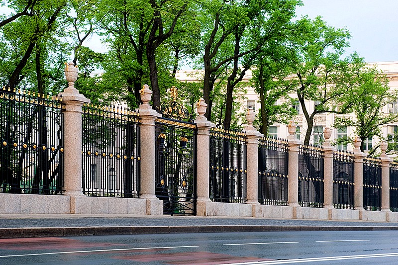The famous wrought-iron fence of the Summer Garden and the Summer Palace of Peter the Great in Saint-Petersburg, Russia