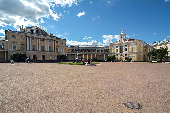 Tourists in front of the Grand Palace in Pavlovsk royal estate, south of St Petersburg, Russia