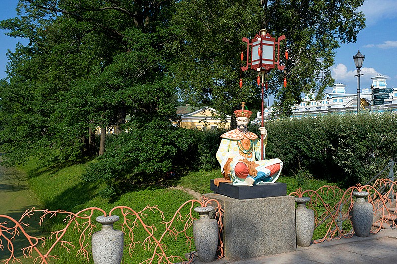 Sculpture of a Chinese man on the Grand Chinese Bridge in Tsarskoye Selo (Pushkin), south of St Petersburg, Russia