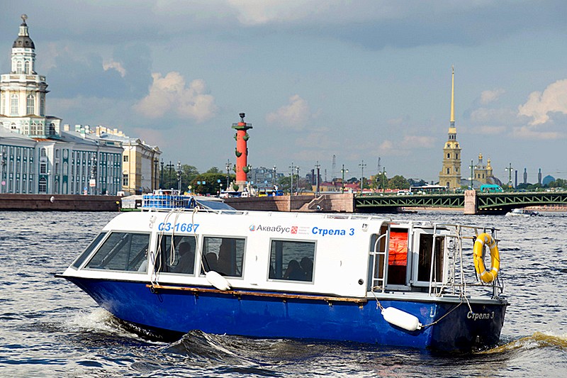 Aquabus water taxi in front of the famous sights of Saint Petersburg, Russia