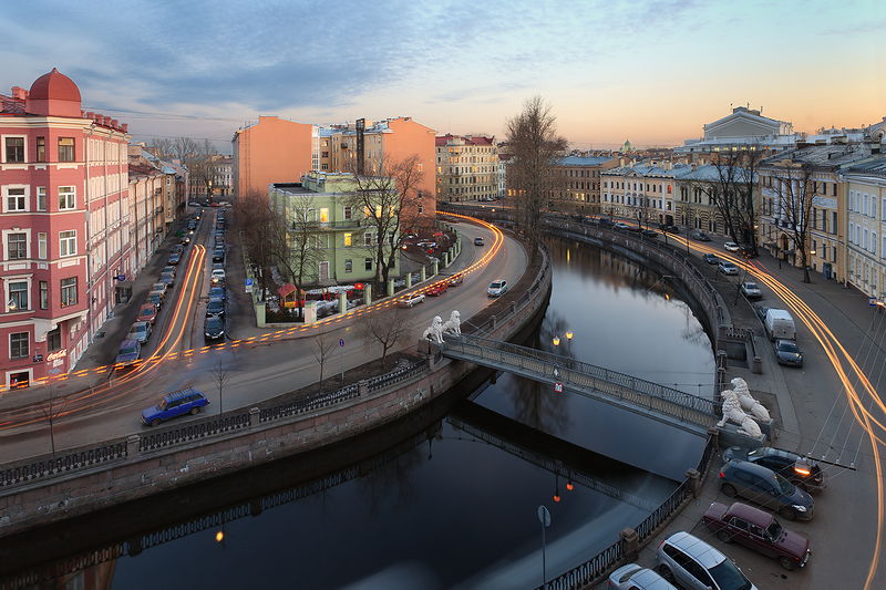 Lion Bridge and a view of the Griboedov Canal in St Petersburg, Russia Lion Bridge and a view of the Griboedov Canal in St Petersburg, Russia