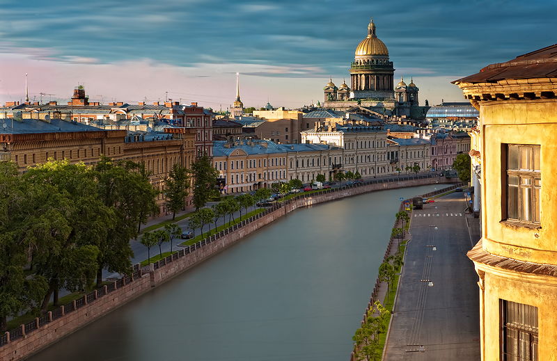 Moyka River and St.Isaac's Cathedral in Saint-Petersburg, Russia Moyka River and St.Isaac's Cathedral in Saint-Petersburg, Russia