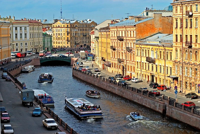 Small boats on the Moyka River in St Petersburg, Russia Small boats on the Moyka River in St Petersburg, Russia
