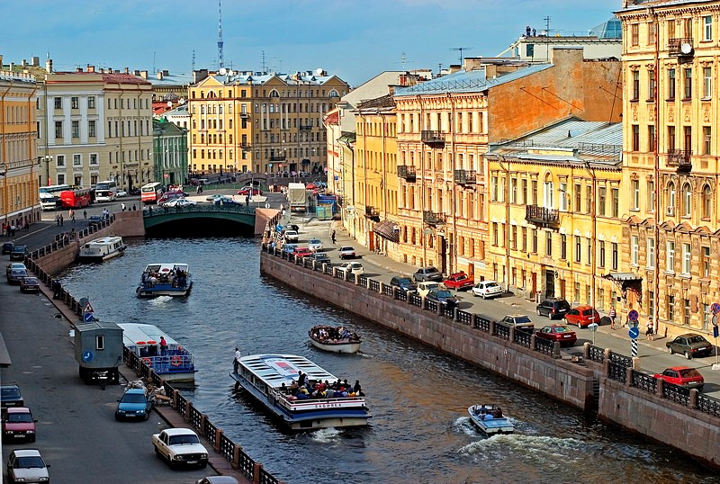 Small boats on the Moyka River in St Petersburg, Russia