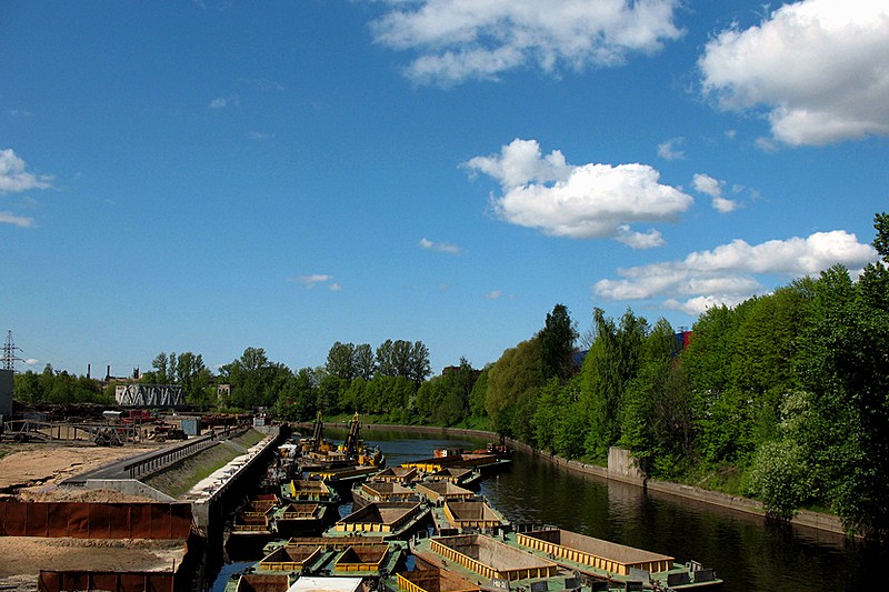 Empty barges on the Okhta River in Saint-Petersburg, Russia