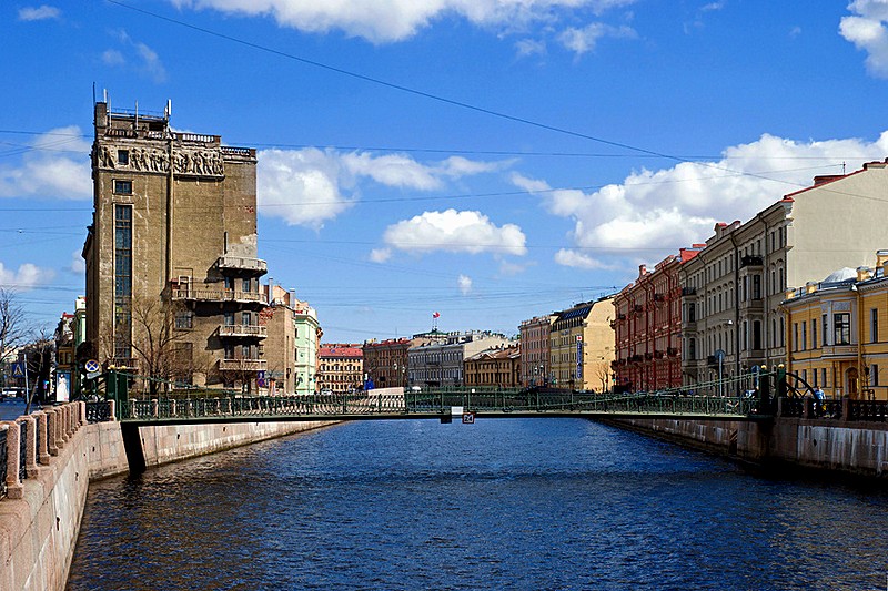 Pochtamtskiy Bridge over the Moyka River and the former German Reformed Church in St Petersburg, Russia