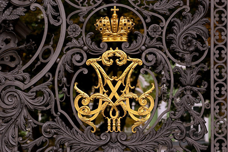 Monogram of Alexander III and his wife Maria Feodorovna on Main Gate at Hermitage in St. Petersburg, Russia