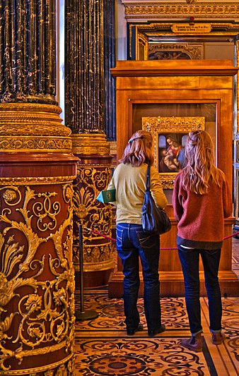 Tourists in Front of Leonardo's Madonna Litta at the Hermitage Museum in Saint-Petersburg, Russia