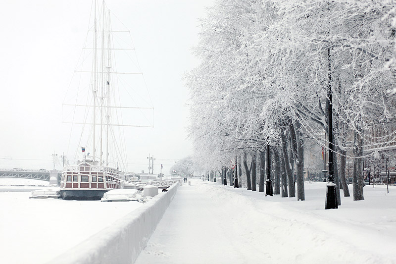 Winter scene on Admiralteyskaya Embankment in Saint-Petersburg, Russia